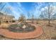 Landscaped backyard with a curved pathway at 4280 Crystal Dr, Broomfield, CO 80023