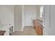 Convenient laundry room with built-in cabinets and a door to outside at 4280 Crystal Dr, Broomfield, CO 80023