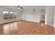 Hardwood floor living room with access to bathroom and other rooms at 4280 Crystal Dr, Broomfield, CO 80023