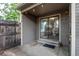 Cozy covered patio featuring string lights and sliding glass doors to the dining area at 4621 S Fraser Cir # A, Aurora, CO 80015