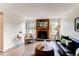 Comfortable living room with a fireplace, stylish furnishings, and ample space for relaxation at 4621 S Fraser Cir # A, Aurora, CO 80015