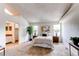 Spacious main bedroom with vaulted ceilings, neutral carpet, and a relaxing, airy ambiance at 4621 S Fraser Cir # A, Aurora, CO 80015