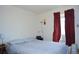 Cozy bedroom featuring a comfortable bed and soft natural light at 11299 E 159Th Pl, Brighton, CO 80602