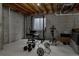 Basement home gym featuring weightlifting equipment and concrete floors at 11538 Hudson St, Thornton, CO 80233