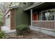 Charming home exterior showcasing brick accents, a covered porch, and lush landscaping at 11538 Hudson St, Thornton, CO 80233