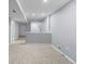 Unfinished basement space with neutral carpet, recessed lighting, and potential for customization at 2691 E 132Nd Ave, Thornton, CO 80241
