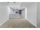 Finished basement featuring neutral carpet, recessed lighting, and built in shelving at 2691 E 132Nd Ave, Thornton, CO 80241
