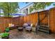 Outdoor patio features stylish seating area and umbrella perfect for entertaining at 2319 Decatur St, Denver, CO 80211