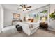 Bright bedroom featuring a large window, neutral walls, and comfortable decor at 2319 Decatur St, Denver, CO 80211