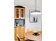 Dining area with a view of stylish cabinetry, granite countertop and pendant lighting at 2319 Decatur St, Denver, CO 80211