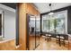 Bright kitchen with stainless steel refrigerator, natural light, and hardwood floors at 2319 Decatur St, Denver, CO 80211