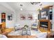 Elegant living room featuring a cozy fireplace and stylish furnishings at 2319 Decatur St, Denver, CO 80211