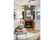Cozy living room features a fireplace with tile accents and hardwood floors at 2319 Decatur St, Denver, CO 80211