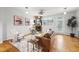 Bright living room with fireplace, hardwood floors and large windows at 2319 Decatur St, Denver, CO 80211