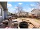 Cozy deck with outdoor seating, a grill, and a fire pit, perfect for entertaining at 17623 Cornish Pl, Parker, CO 80134