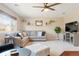 Cozy living room with comfortable seating, neutral tones, and bright natural light at 17623 Cornish Pl, Parker, CO 80134