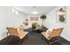 Finished basement featuring two chairs, modern sofa, neutral decor and carpeted floor at 1920 S Niagara St, Denver, CO 80224