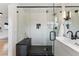Luxurious bathroom with walk-in shower, modern fixtures, and sleek design, providing a spa-like experience at 1920 S Niagara St, Denver, CO 80224