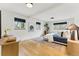 Spacious bedroom with bright windows, wood floors, and decorative rug creating a cozy and inviting atmosphere at 1920 S Niagara St, Denver, CO 80224