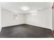 Spare bedroom with neutral carpet, white walls, and natural light at 1920 S Niagara St, Denver, CO 80224