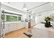 Modern kitchen featuring white cabinetry, stainless steel appliances, and sleek countertops at 1920 S Niagara St, Denver, CO 80224