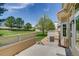 Concrete back patio and manicured lawn create a relaxing outdoor living space at 3179 S Indiana St, Lakewood, CO 80228
