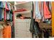Organized walk-in closet with shelving, drawers, and hanging space for clothes at 3179 S Indiana St, Lakewood, CO 80228