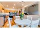 Kitchen with modern stainless steel appliances, granite counters, and an eat in breakfast table at 3179 S Indiana St, Lakewood, CO 80228