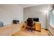 Office space with built-ins, hardwood floors and natural light at 3179 S Indiana St, Lakewood, CO 80228