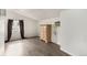 Neutral room with great natural light, laminate flooring and a chest of drawers at 805 5Th St, Fort Lupton, CO 80621