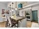 Modern kitchen with stone countertops, stainless steel appliances, ample cabinets, and great lighting at 805 5Th St, Fort Lupton, CO 80621