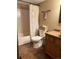 Cozy bathroom features a shower/tub combo and vanity with countertop and sink at 17046 Wellington Dr, Parker, CO 80134