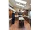 Well-equipped kitchen with stainless steel appliances, granite countertops, and an island with seating at 17046 Wellington Dr, Parker, CO 80134