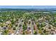 The house is located in a tree-filled neighborhood with a nearby park, offering a blend of residential and recreational spaces at 6441 W 73Rd Pl, Arvada, CO 80003
