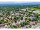 A scenic neighborhood near roads is surrounded by lush trees, offering both convenience and natural beauty at 6441 W 73Rd Pl, Arvada, CO 80003