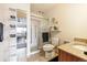 Bright bathroom featuring a walk-in shower, tiled floors, and modern fixtures at 715 S Alton Way # 5D, Denver, CO 80247