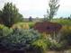 Entrance to Emerald Greens Golf Club with lush greenery and beautiful landscaping at 715 S Alton Way # 5D, Denver, CO 80247