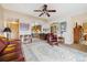Open living room with a view of the kitchen and dining area at 715 S Alton Way # 5D, Denver, CO 80247