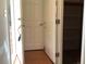 Entryway with a door leading to the garage, showcasing a secure and practical layout at 11947 Riverstone Cir # 7F, Henderson, CO 80640