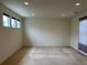 Bright living room featuring recessed lighting, neutral carpet and multiple windows at 11947 Riverstone Cir # 7F, Henderson, CO 80640