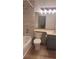 Modern bathroom with updated fixtures and a tiled shower and tub at 1818 S Quebec Way # 5-7, Denver, CO 80231