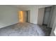 Spacious bedroom with neutral carpeting, ample closet space, and bright natural light at 1818 S Quebec Way # 5-7, Denver, CO 80231