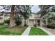 Inviting townhouse with well-maintained lawn and mature trees at 1818 S Quebec Way # 5-7, Denver, CO 80231