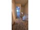 Hallway with carpeted floor leading to other rooms of the home at 1818 S Quebec Way # 5-7, Denver, CO 80231