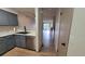Modern kitchen with new stainless steel appliances and wood floor at 1818 S Quebec Way # 5-7, Denver, CO 80231