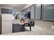 Updated kitchen with granite countertops, stainless steel appliances, and ample cabinet space at 1818 S Quebec Way # 5-7, Denver, CO 80231