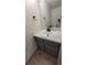 Updated powder room with modern vanity and stylish fixtures at 1818 S Quebec Way # 5-7, Denver, CO 80231