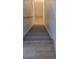 Staircase with wooden steps at 1818 S Quebec Way # 5-7, Denver, CO 80231
