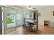 Bright dining area with sliding glass doors that lead to a covered patio at 6651 S Dudley Ct, Littleton, CO 80123