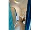 Cozy bathroom with a shower, a vanity, and a toilet at 4618 Se Summit Trl, Evergreen, CO 80439